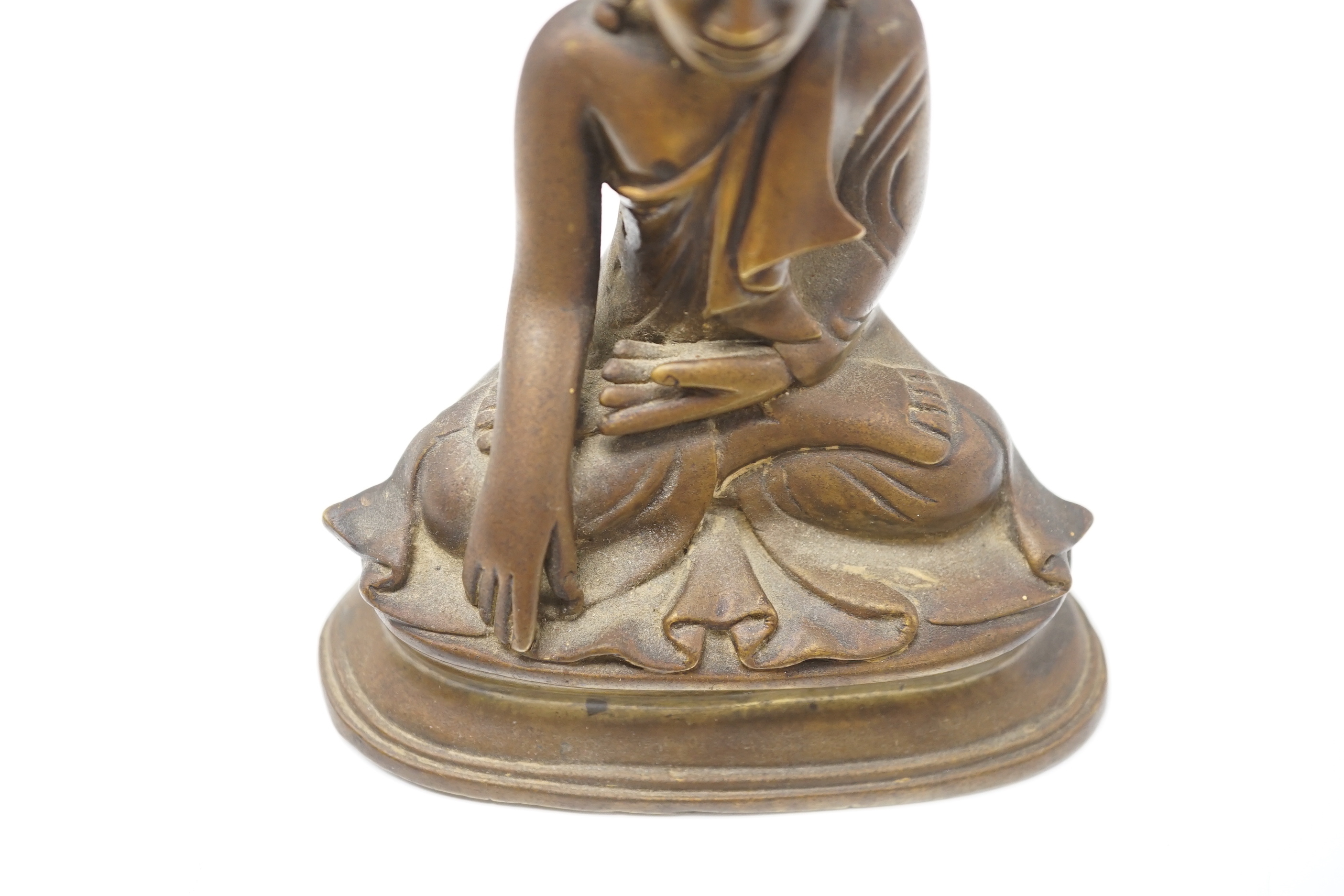A 19th century Burmese bronze buddha, 13cm high